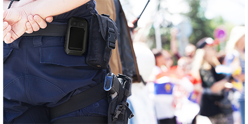AccuRad PRD on a police officer's belt at a large event.